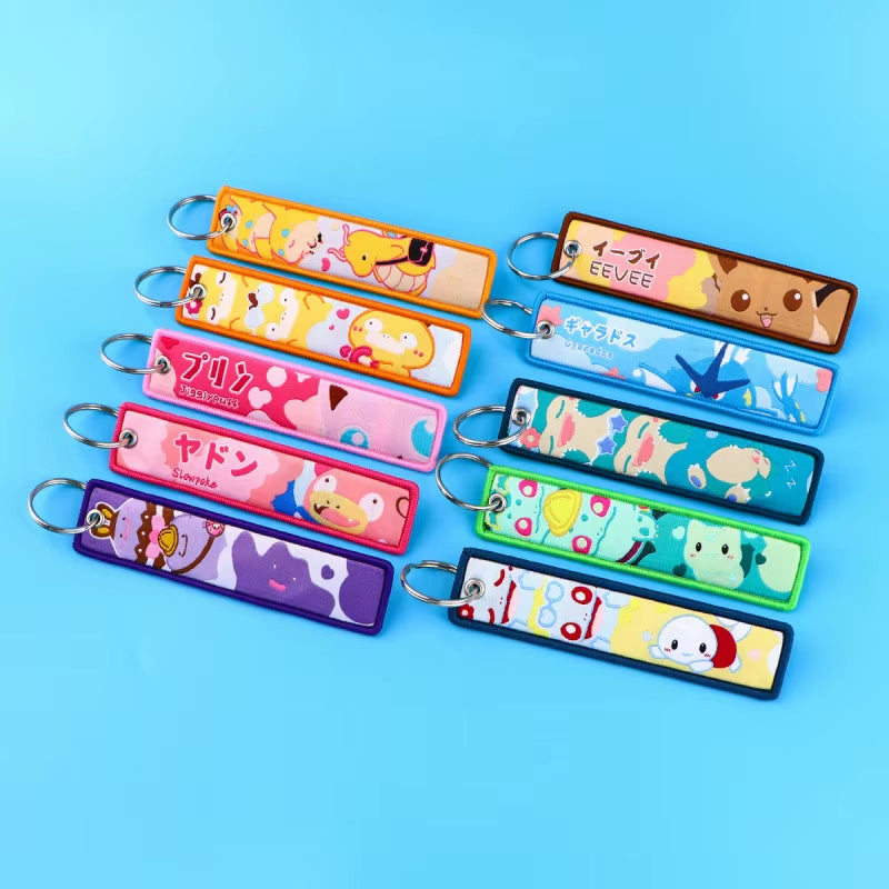Pocket Monster Cartoon Anime Pet Pokemon Woven Label Keychain Pokémon Fabric Hanging Decoration Pendant